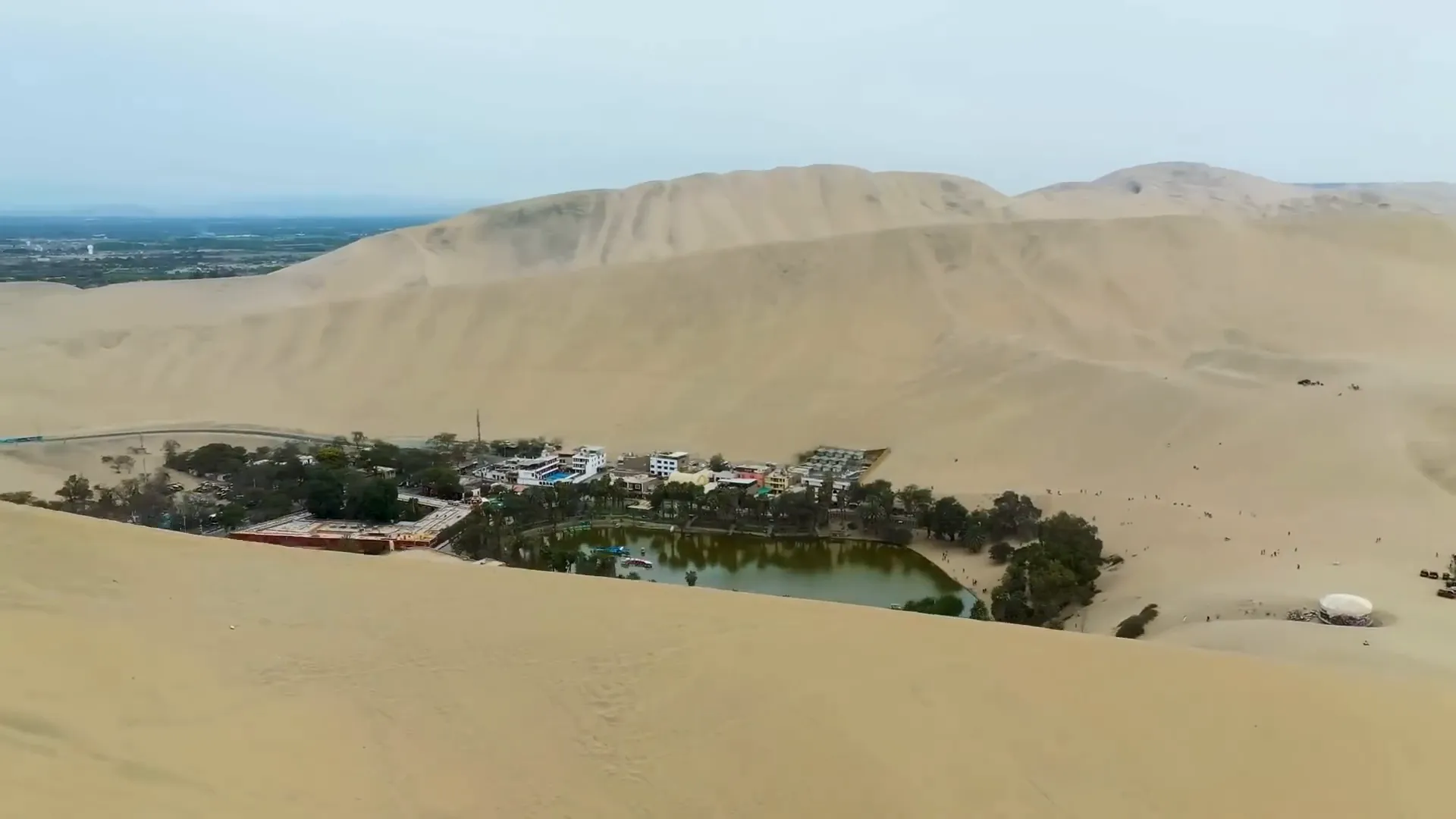 Sunset over the oasis of Huacachina